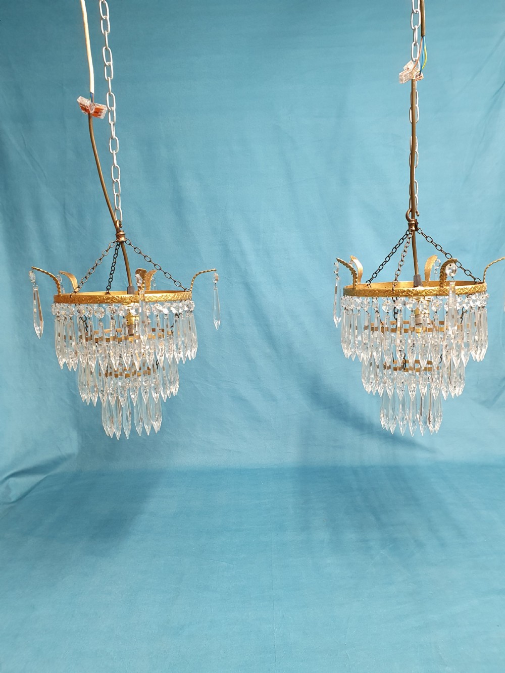 Early 20th century pair of spike chandelier with finials to the edge