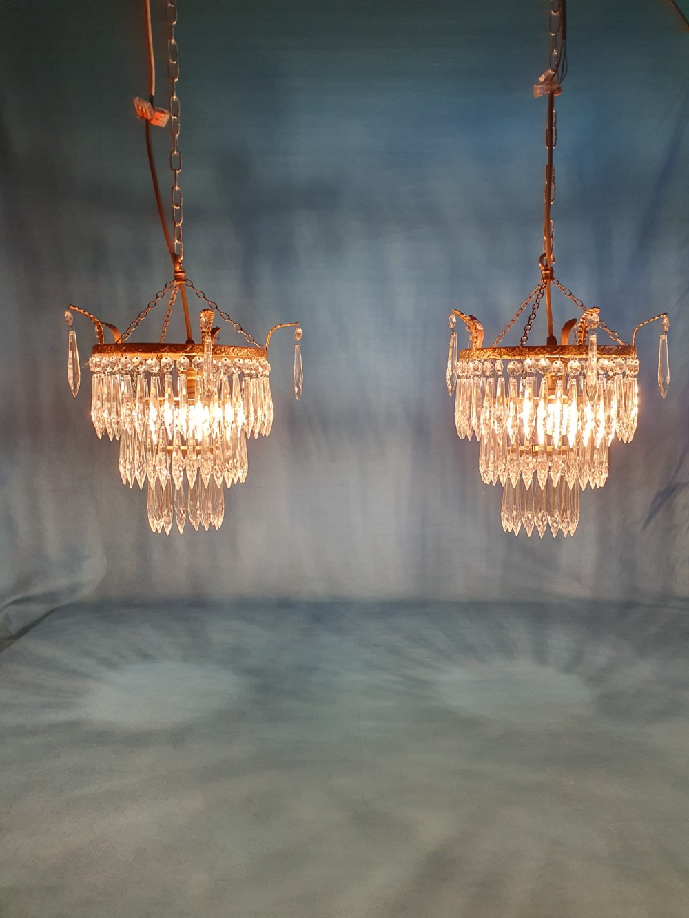 Early 20th century pair of spike chandelier with finials to the edge View II