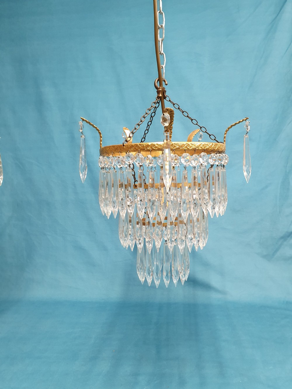 Early 20th century pair of spike chandelier with finials to the edge View VII
