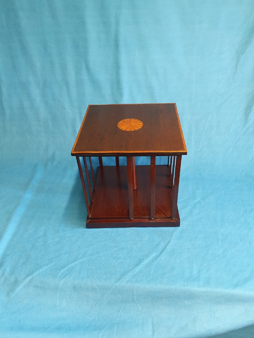 An Edwardian revolving desktop book case View IX