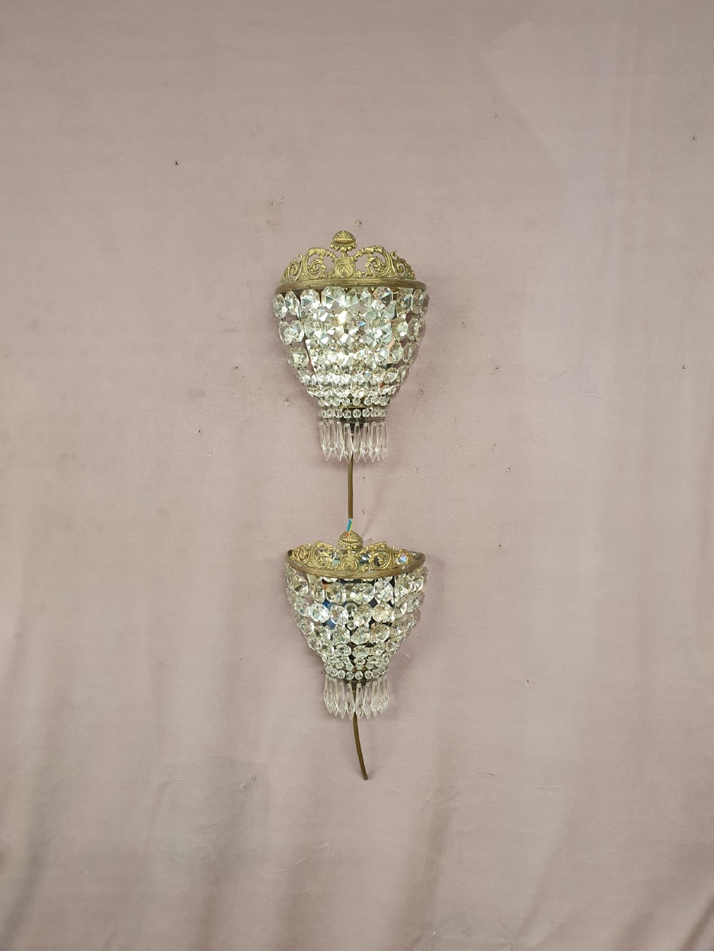Early 20th century pair of swag wall lights