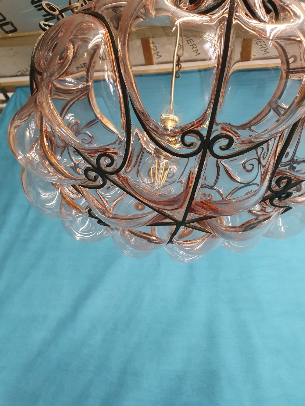 Large handblown glass pendant with wire construction View IV