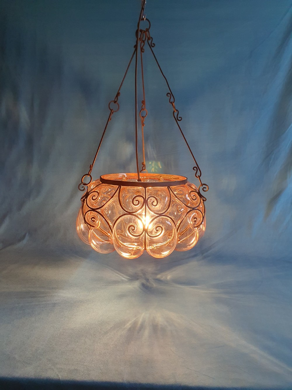 Large handblown glass pendant with wire construction View VII