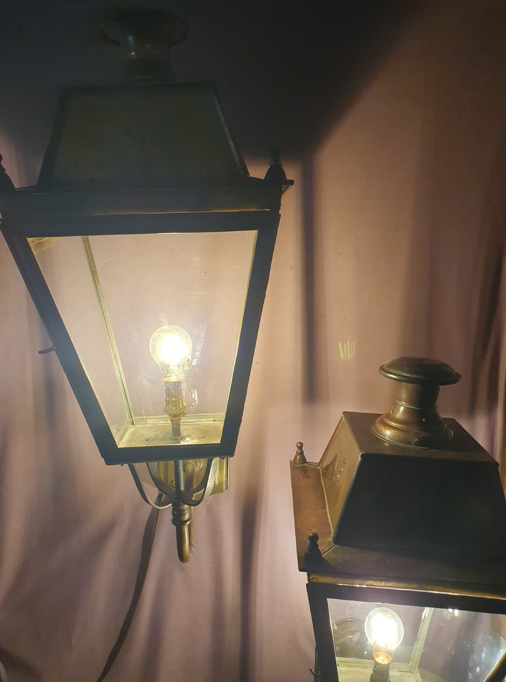 Pair of outside brass porch lights with the letters V R View II