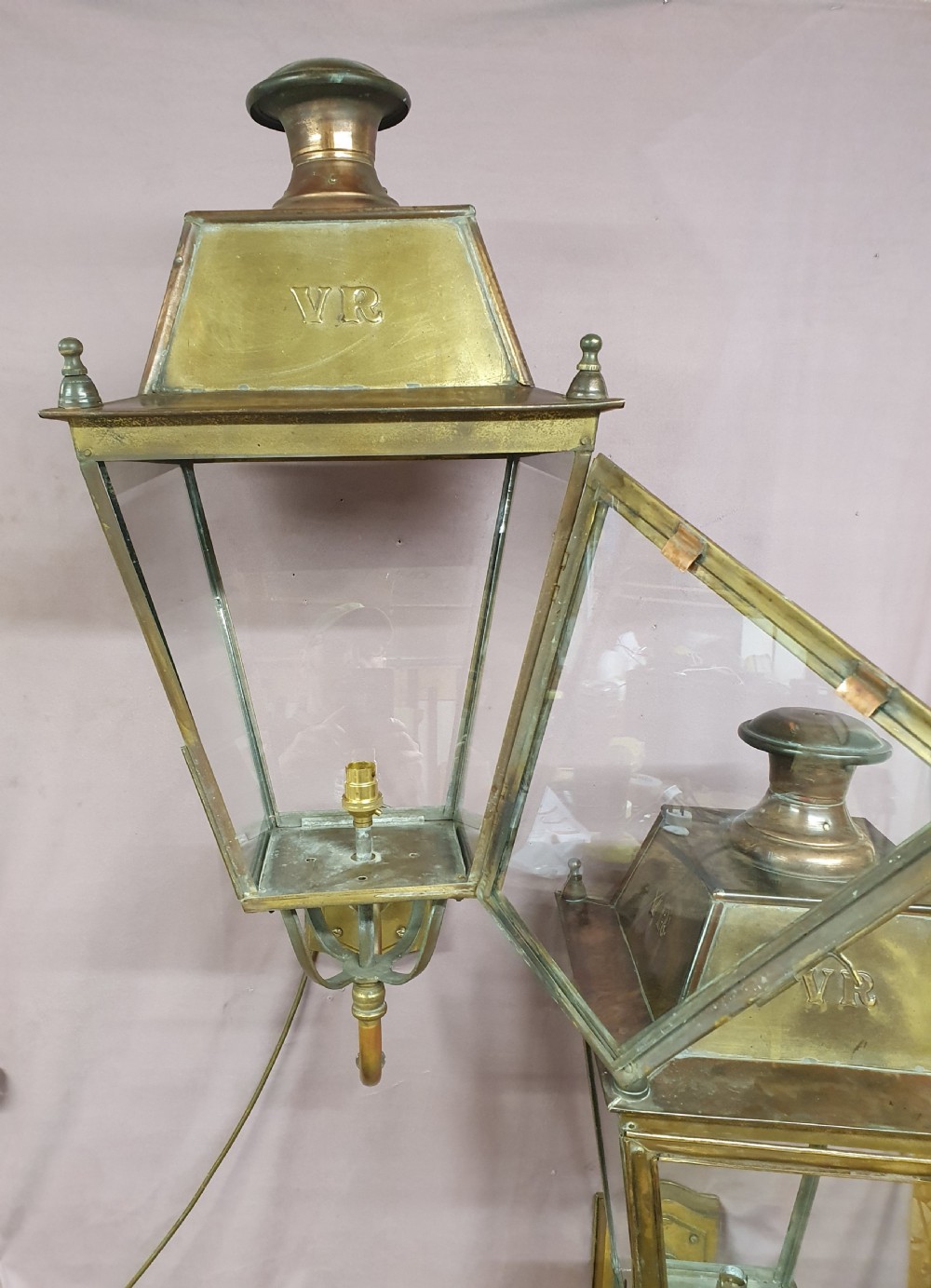 Pair of outside brass porch lights with the letters V R View VI