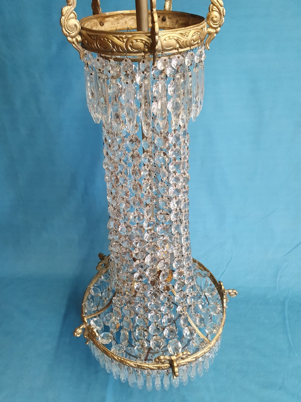 Elegant tall chandelier with six layers of spikes to the bottom View II