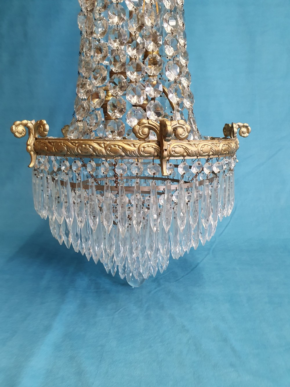 Elegant tall chandelier with six layers of spikes to the bottom View V