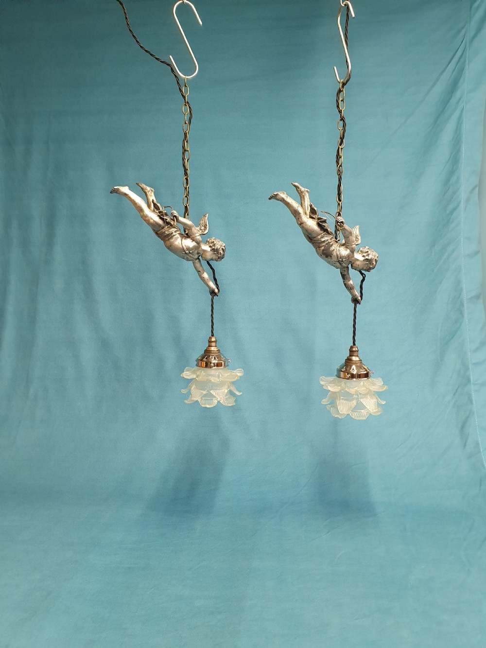 Pair of early 20th century flying cherub lights