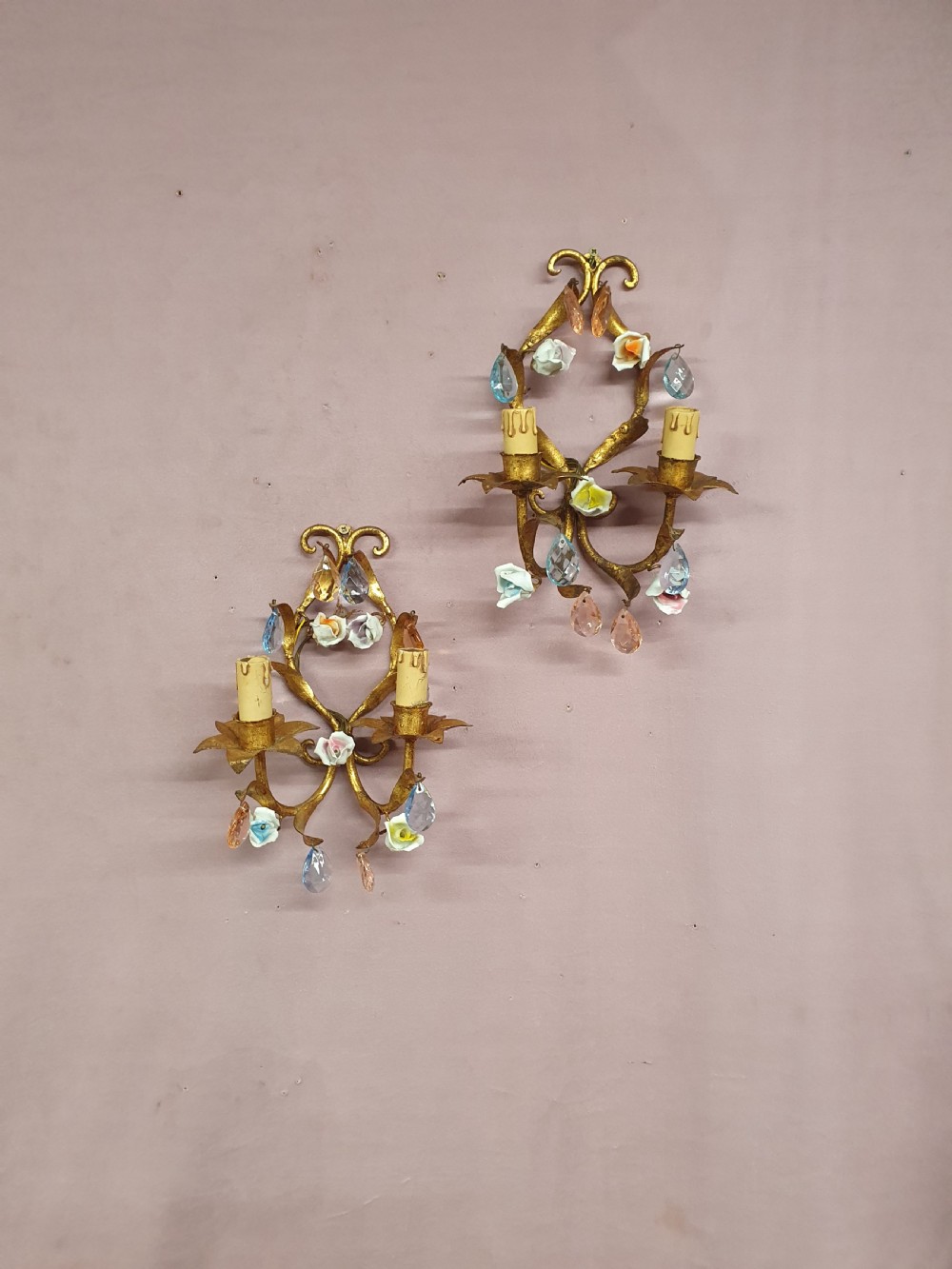 A French gilt metal chandelier and two matching two-arm wall sconces decorated with multi-coloured porcelain flowers and tinted crystal drops. View V