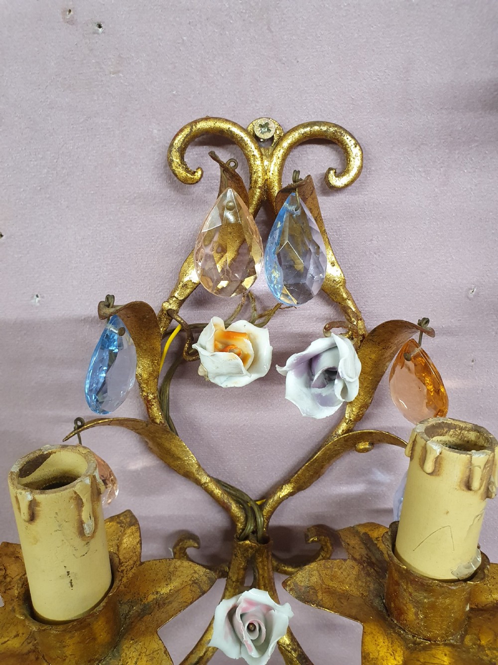 A French gilt metal chandelier and two matching two-arm wall sconces decorated with multi-coloured porcelain flowers and tinted crystal drops. View VII
