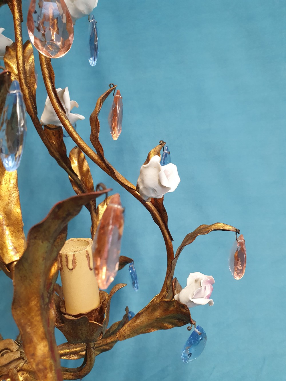 A French gilt metal chandelier and two matching two-arm wall sconces decorated with multi-coloured porcelain flowers and tinted crystal drops. View XI