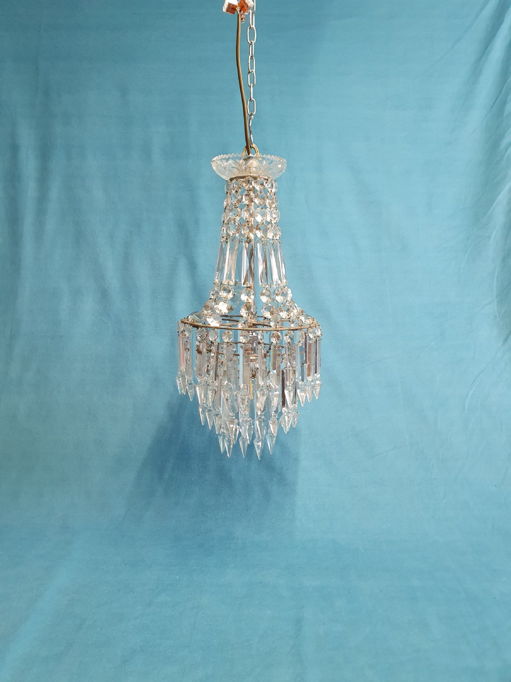 Chandelier with prisms to the top and lusters beneath
