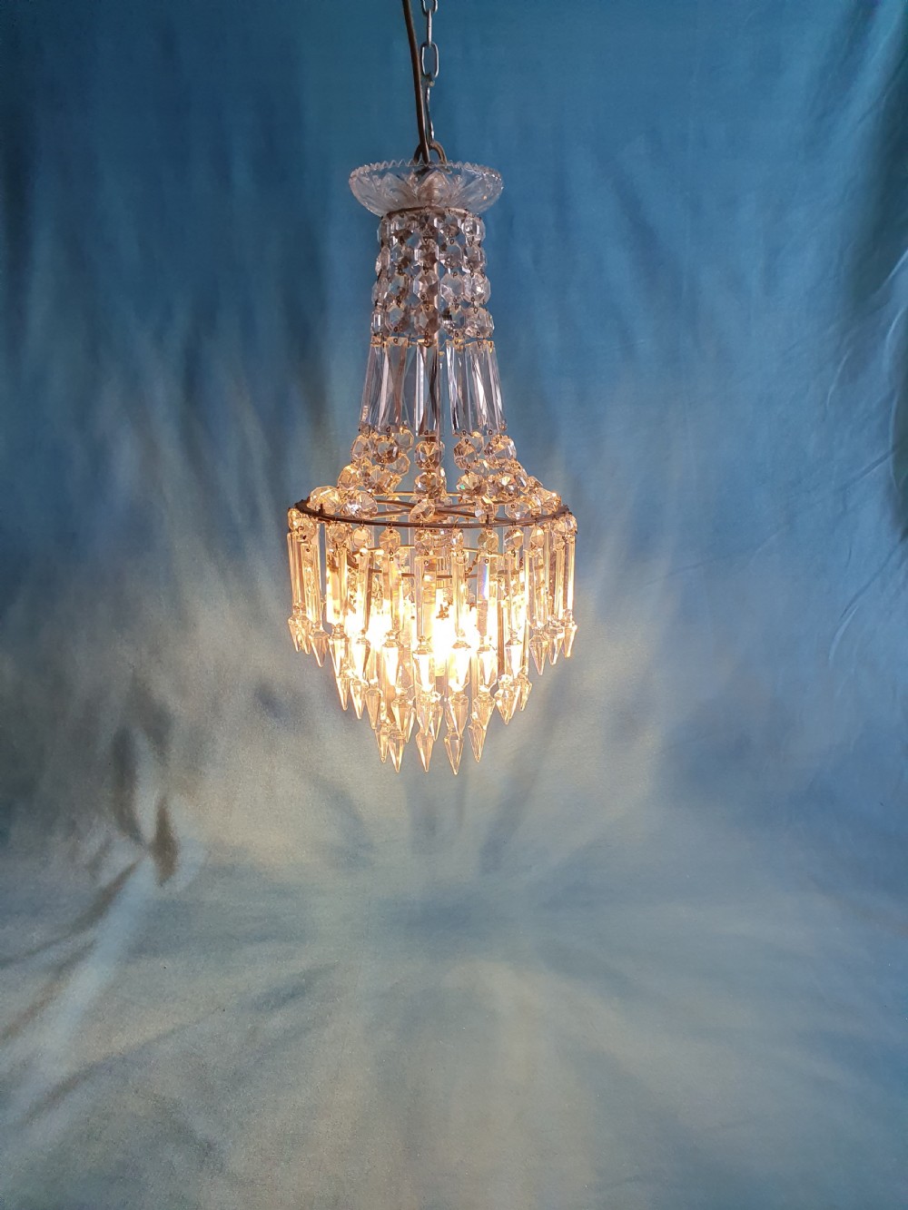 Chandelier with prisms to the top and lusters beneath View III