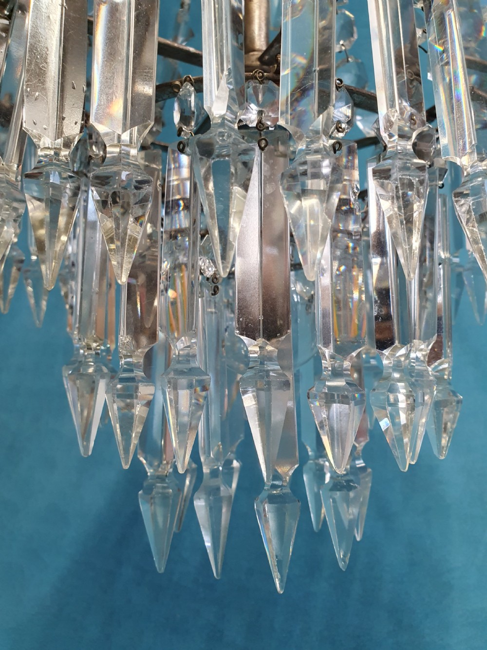 Chandelier with prisms to the top and lusters beneath View VI