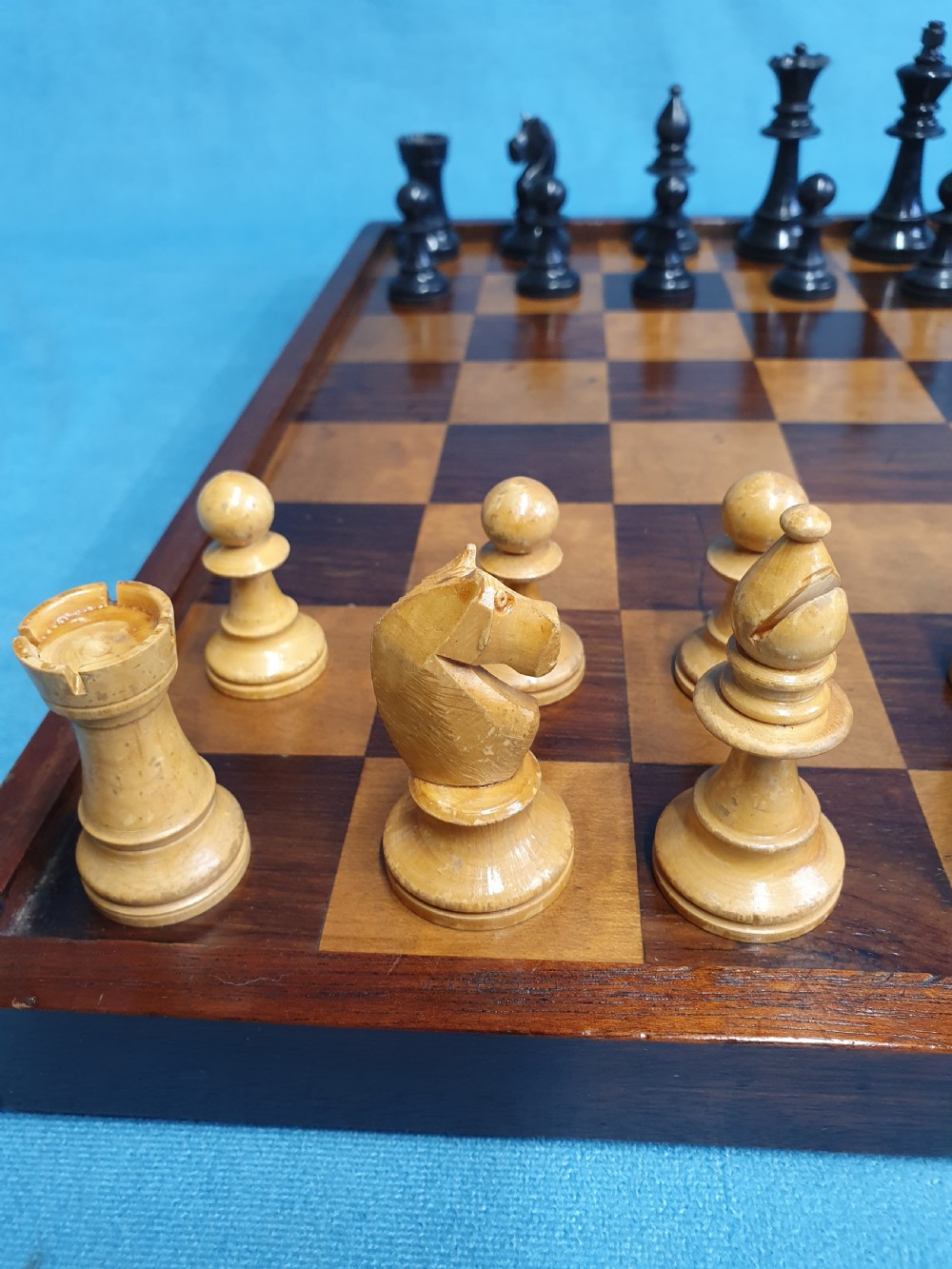 Late 19 century wooden chessboard with early 20th century chess set  View VII