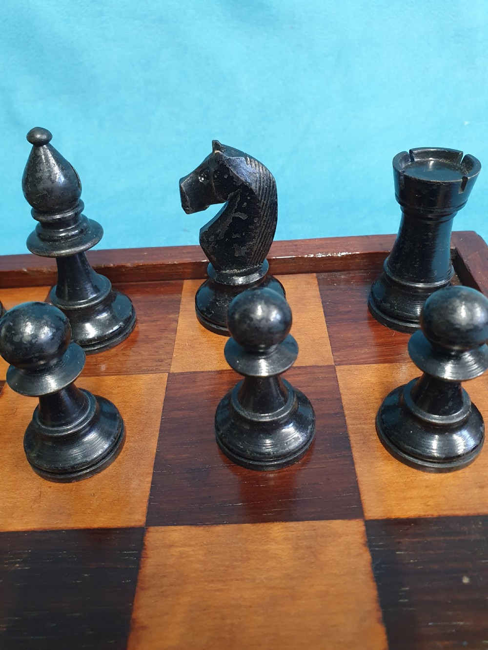 Late 19 century wooden chessboard with early 20th century chess set  View IX