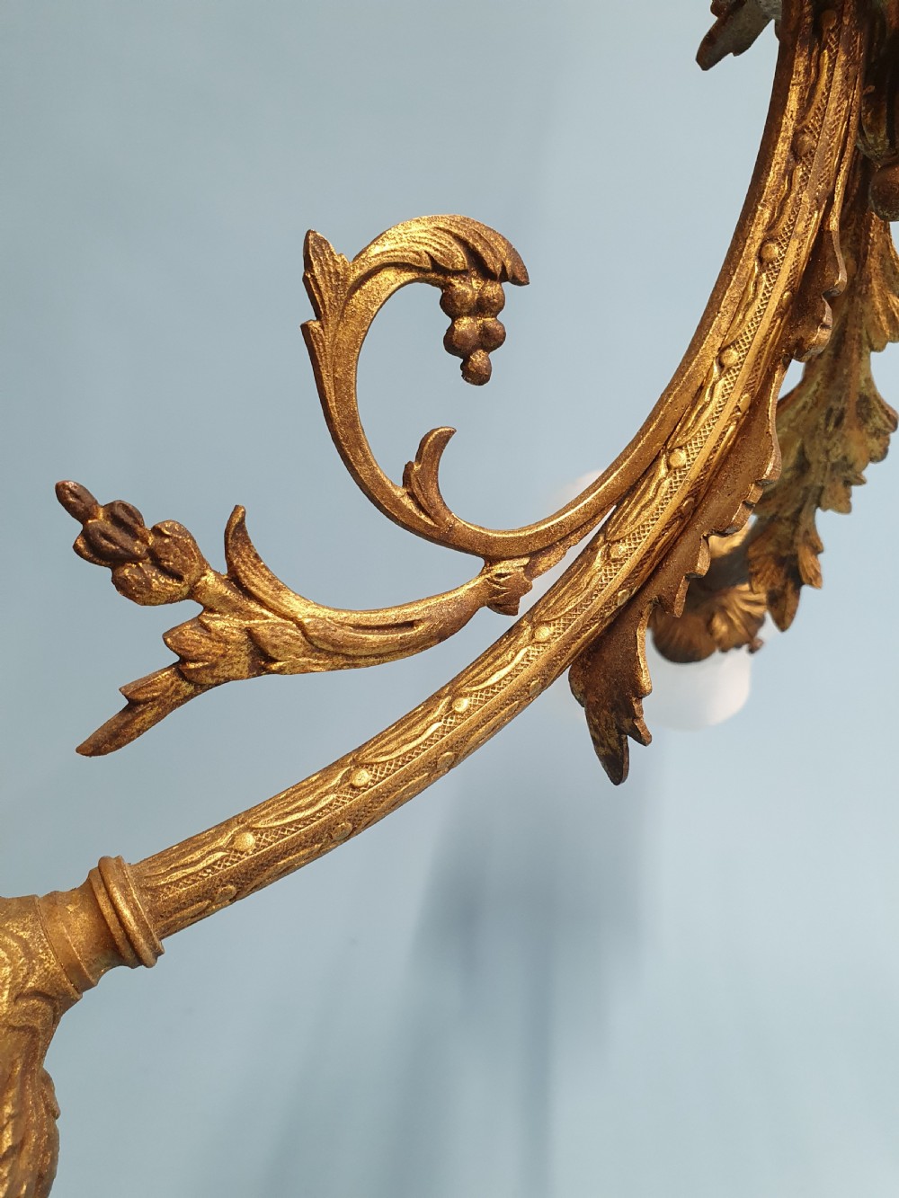 Early 20th century guilt brass chandelier with three glass shades View V