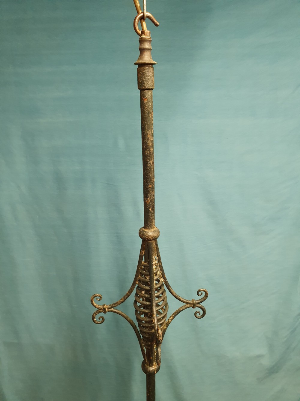 A late 19th-century wrought iron hanging lantern featuring decorative scrollwork, shamrock cutouts along the top canopy, and clear glass side panels. View III