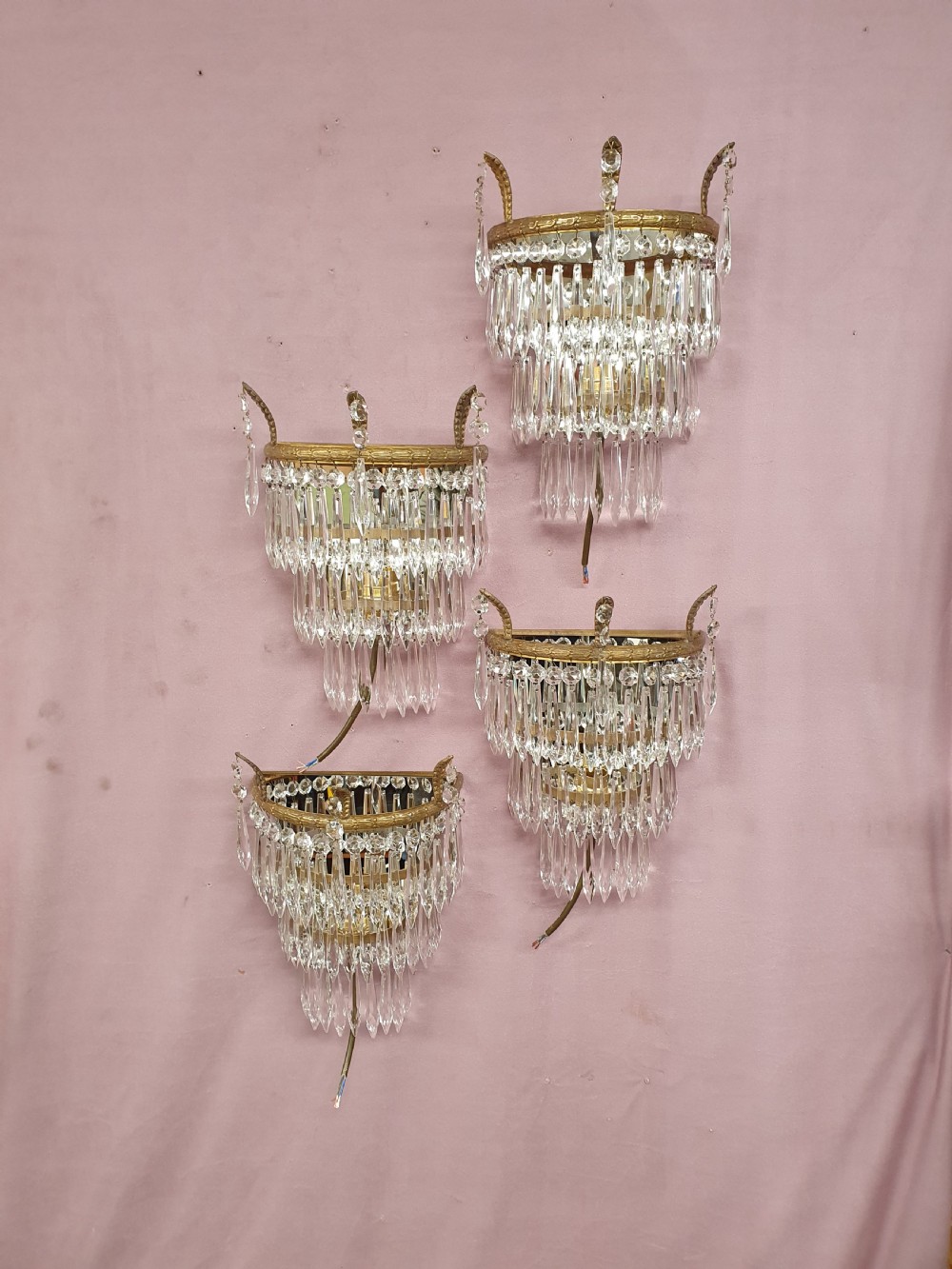 Early 20th century set of four spike wall lights