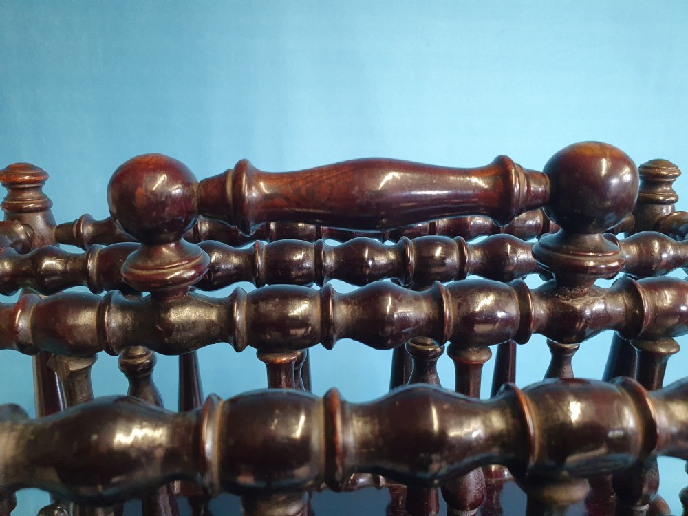 Mid 19th century Bobbin turned Rosewood Canterbury with shelf. View VII