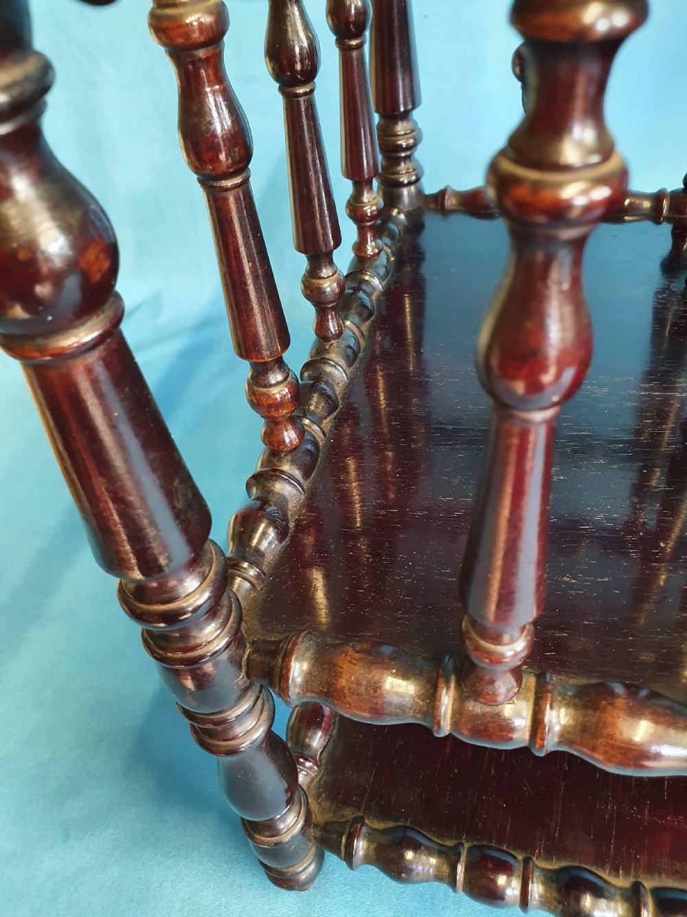 Mid 19th century Bobbin turned Rosewood Canterbury with shelf. View IX