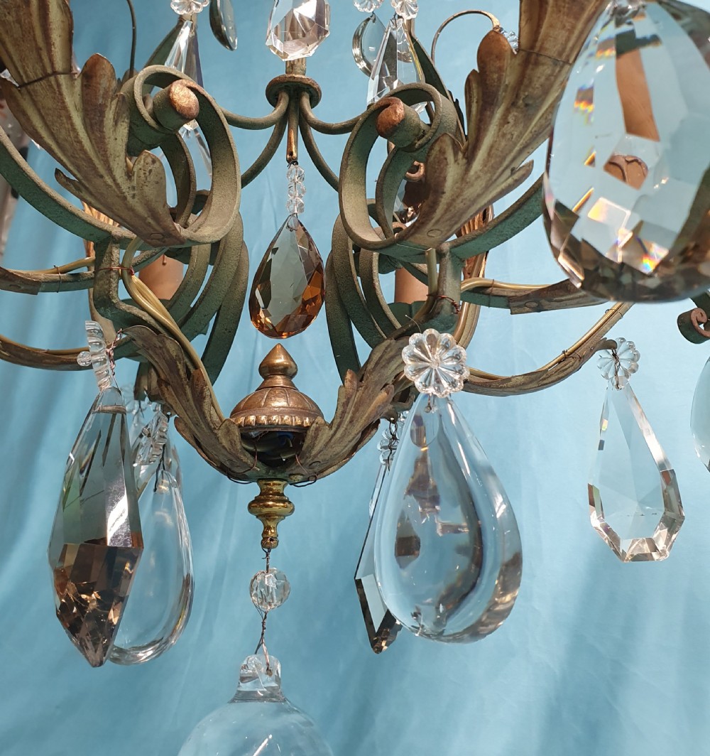 An early twentieth-century French green steel six-light chandelier adorned with faceted crystal glass drops and pleated white fabric shades. View X