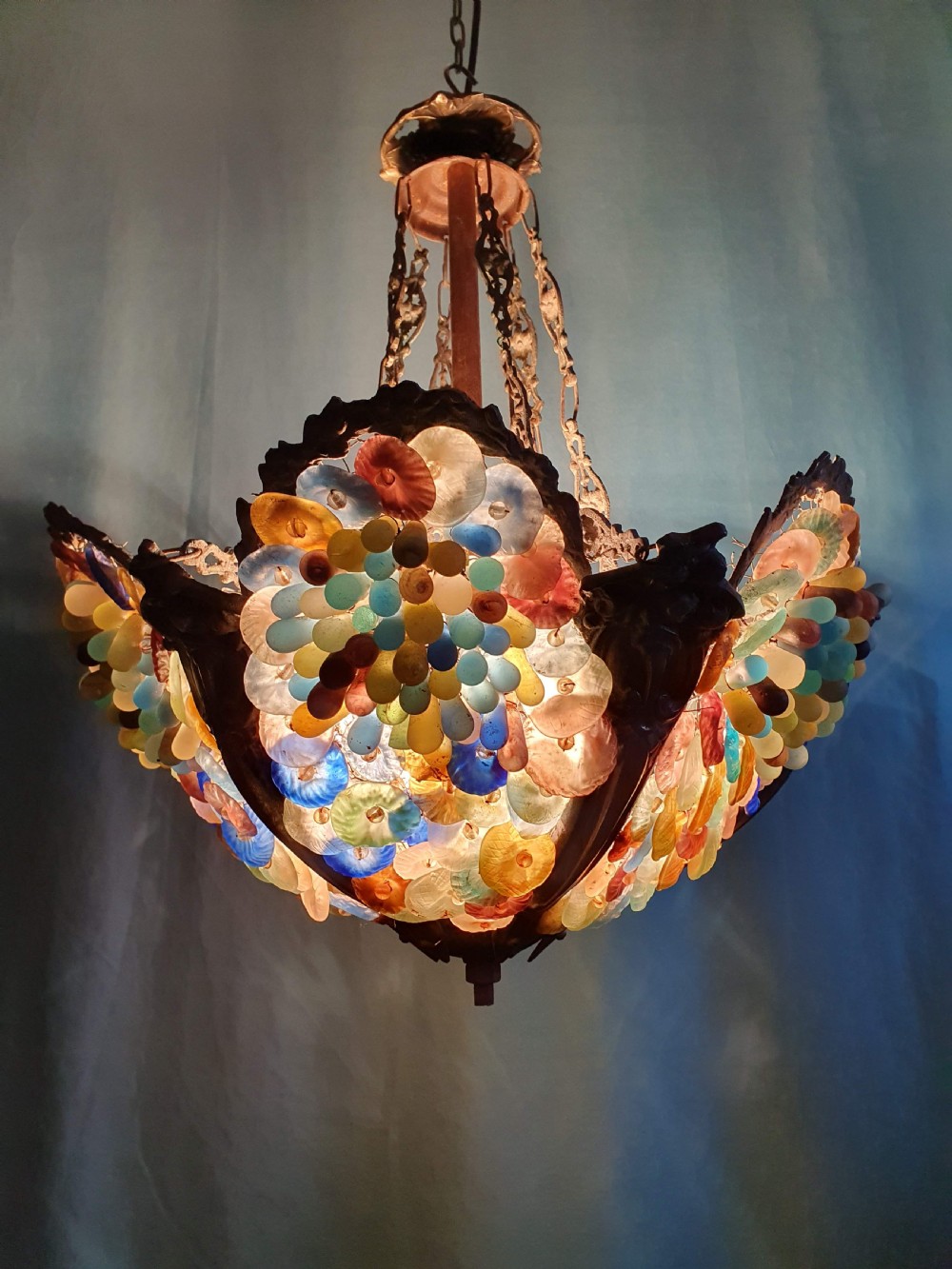 An early 20th-century Continental ceiling chandelier featuring a brass frame decorated with colourful opaque glass grapes and flowers. View III