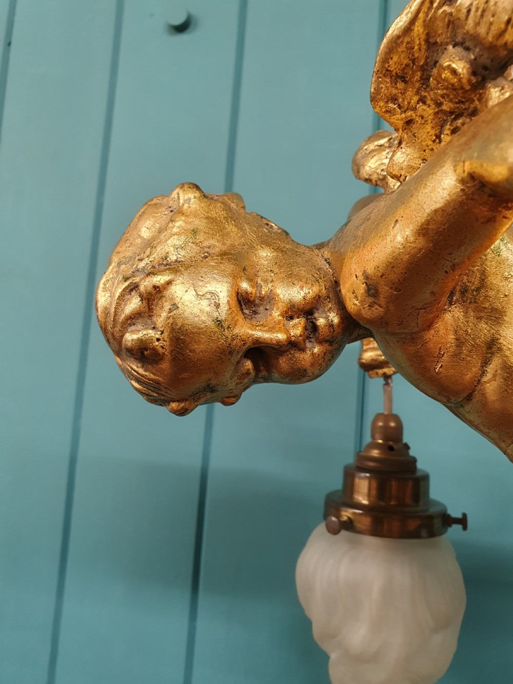 Nice quality gilt cherub with New York flames hanging from the arms 12