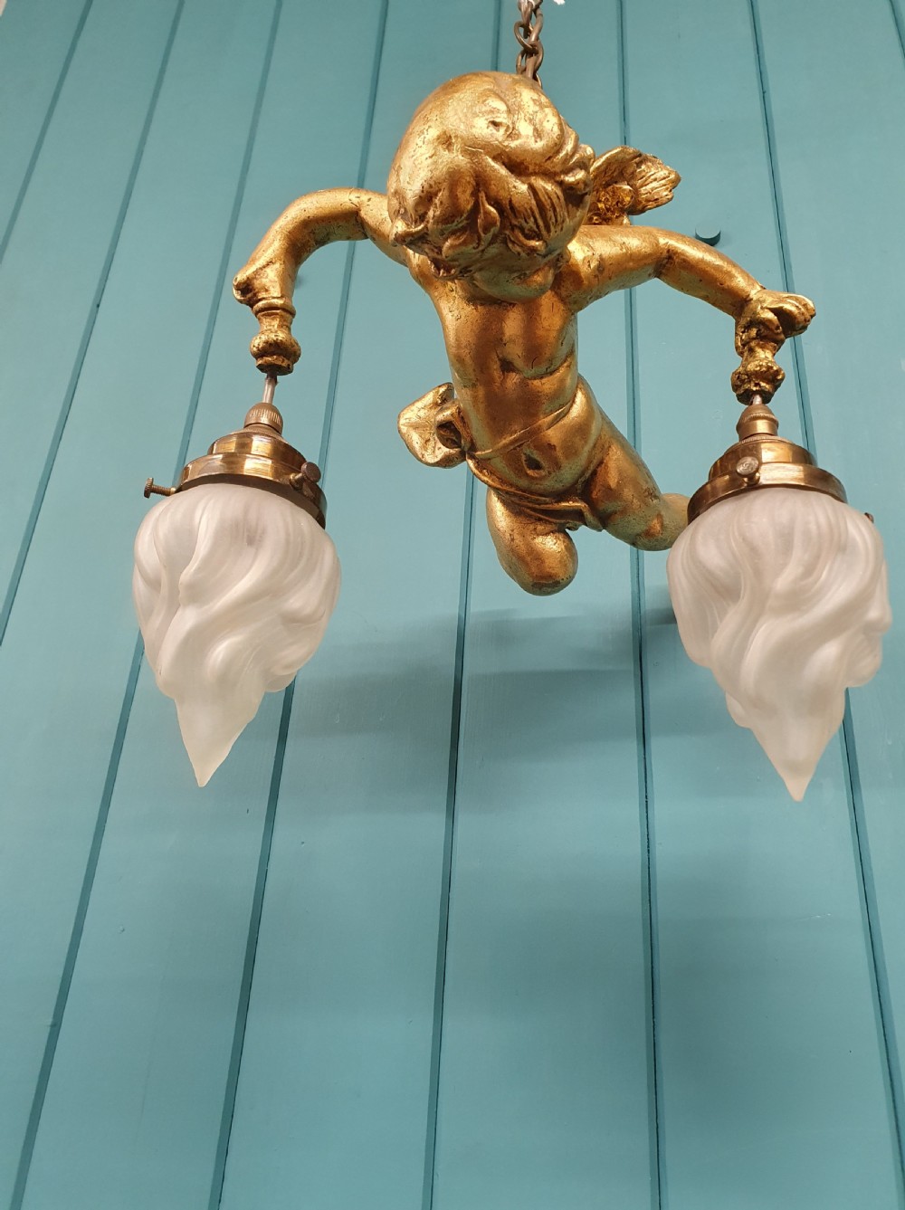 Nice quality gilt cherub with New York flames hanging from the arms 12