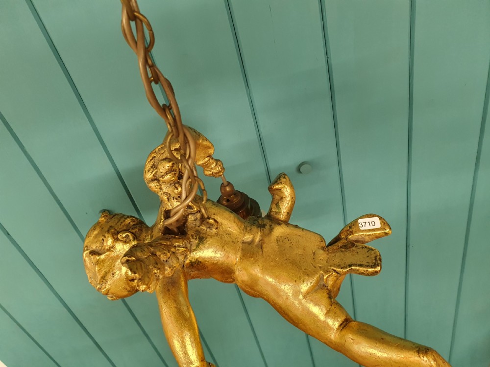 Nice quality gilt cherub with New York flames hanging from the arms 12