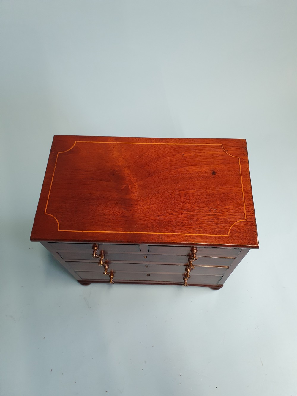 Early 19th century miniature 2/3 mahogany chest of drawers dated 1824. View II