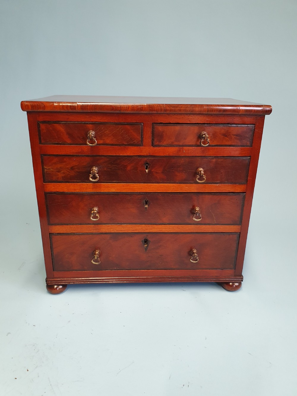 Early 19th century miniature 2/3 mahogany chest of drawers dated 1824. View VI