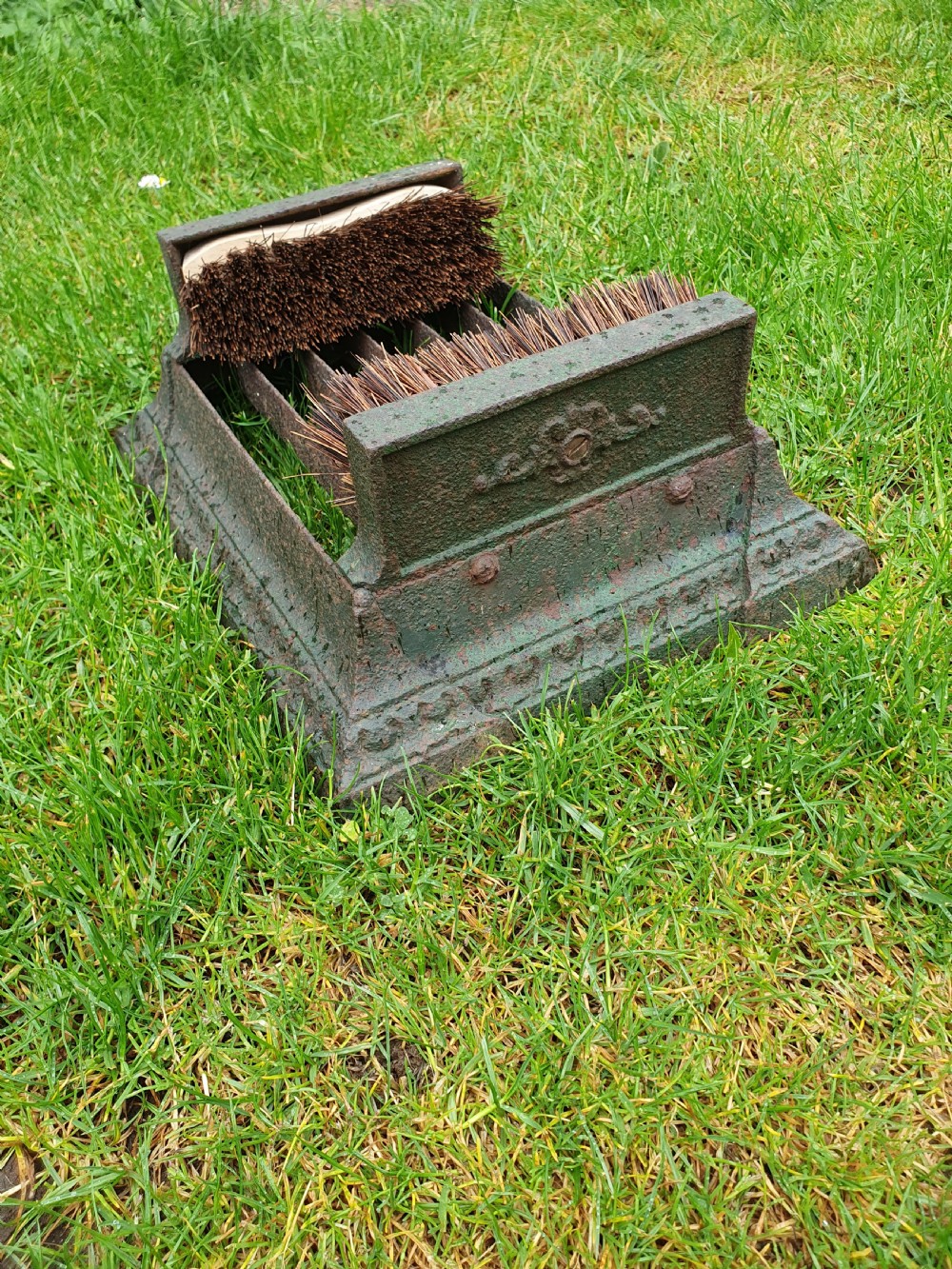 Late 19 century cast iron boot scraper with brushes to the side View V