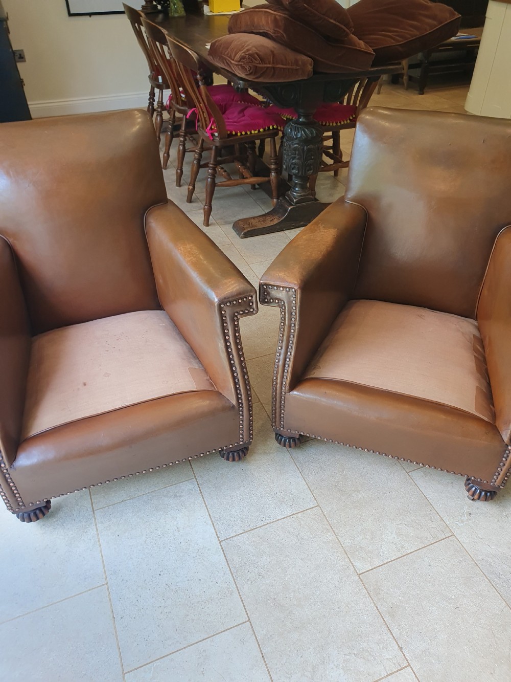 Early 20th century pair of chocolate brown leather chairs View III