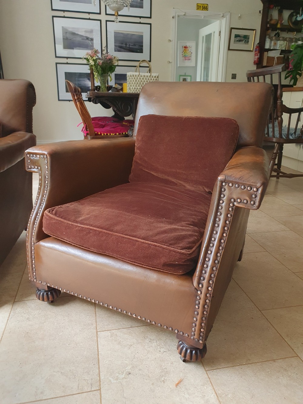 Early 20th century pair of chocolate brown leather chairs View VI