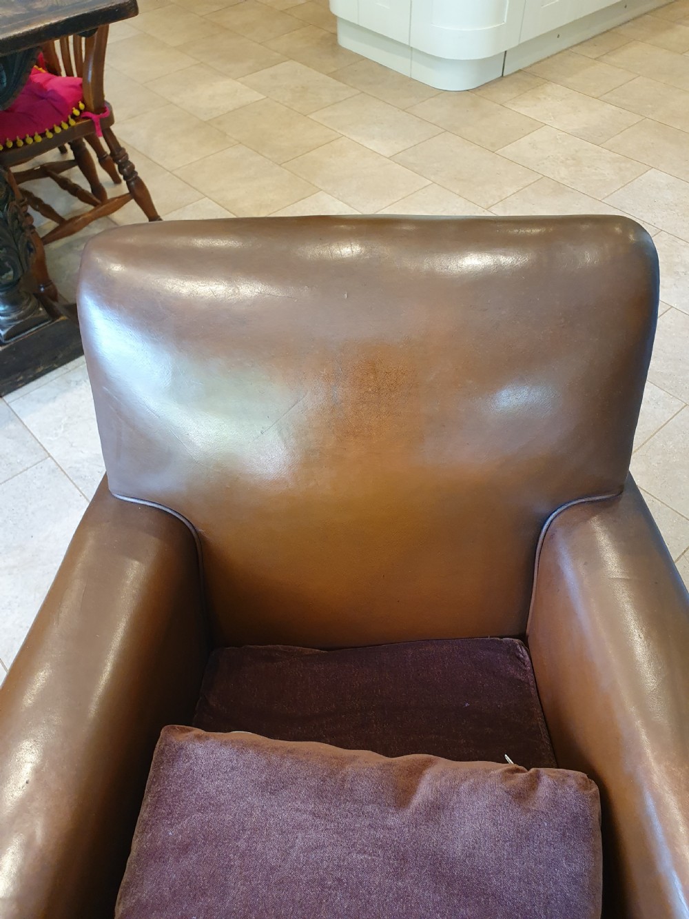 Early 20th century pair of chocolate brown leather chairs View XI