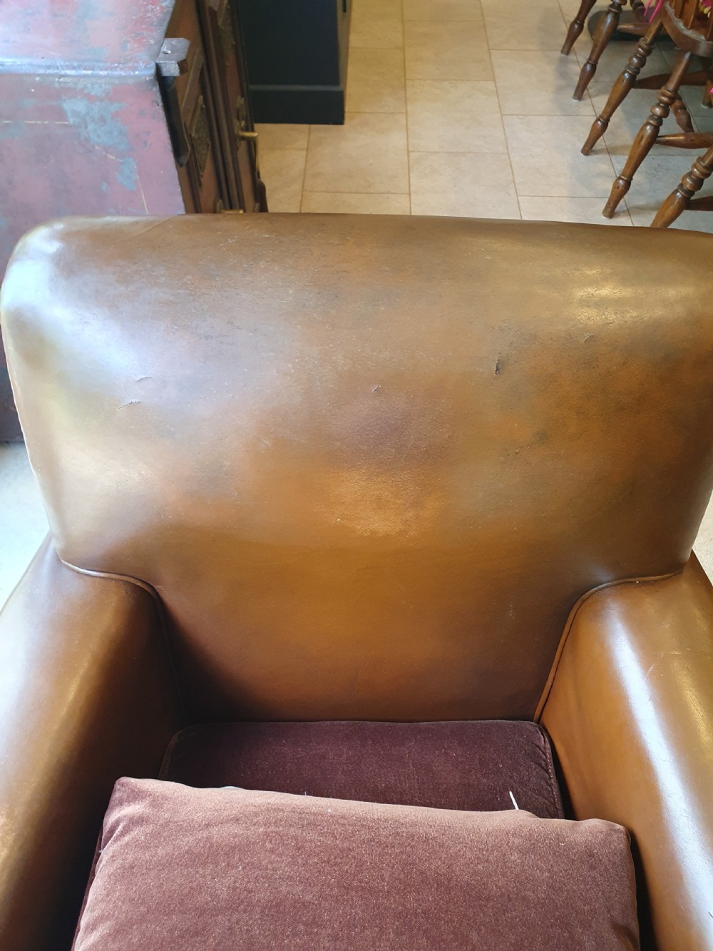 Early 20th century pair of chocolate brown leather chairs View XII