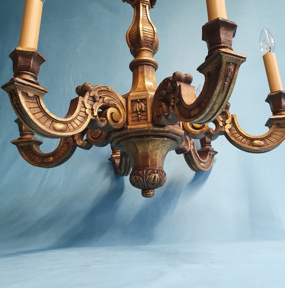 Early 20th century gilt wooden chandelier with six arms 25