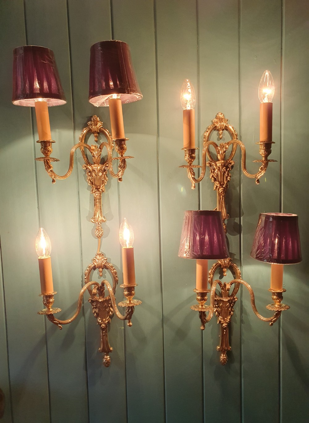 Set of four early 20th century brass wall lights with leaf and acorn design. View III