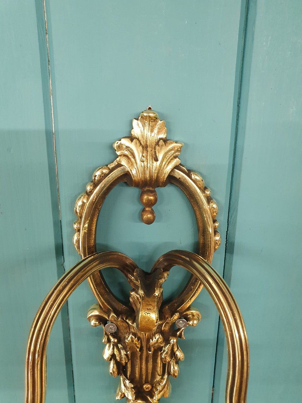 Set of four early 20th century brass wall lights with leaf and acorn design. View IV