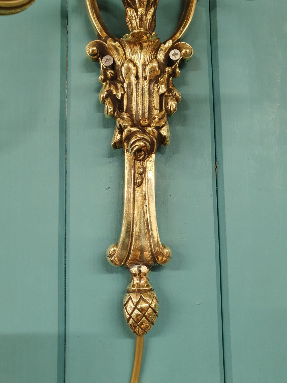 Set of four early 20th century brass wall lights with leaf and acorn design. View VII