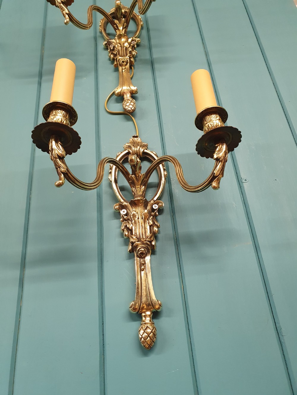 Set of four early 20th century brass wall lights with leaf and acorn design. View VIII
