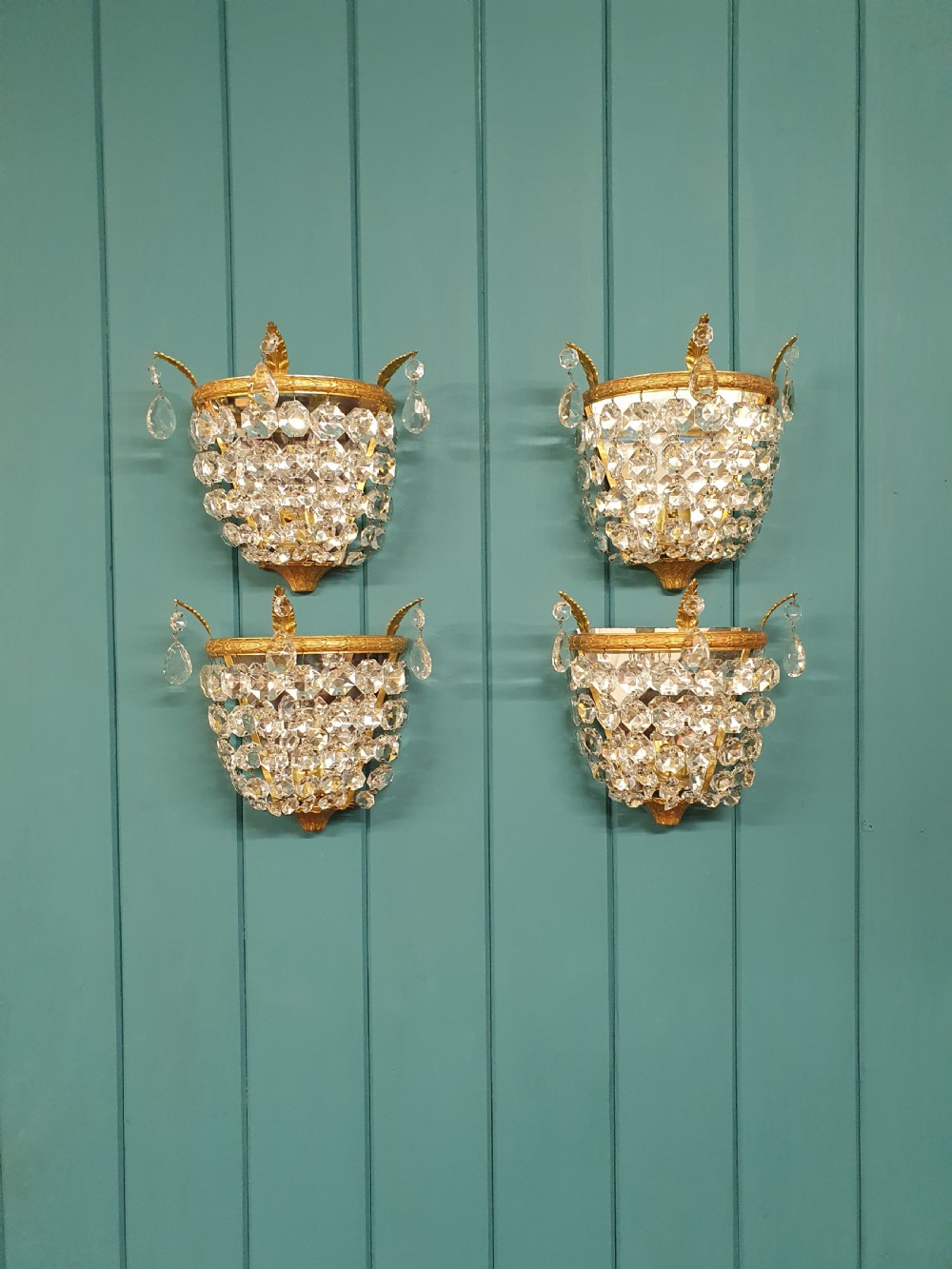 Early 20th century set of four bag wall lights