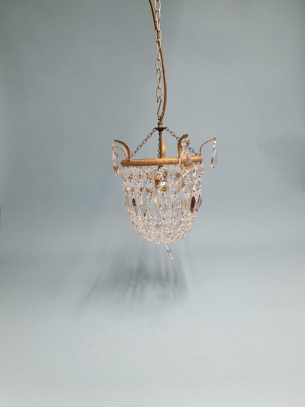 Early 20th century bag chandelier with prisms and finials to the top 11