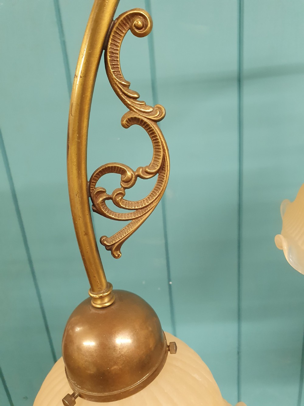 Edwardian three light brass chandelier with glass shades 23
