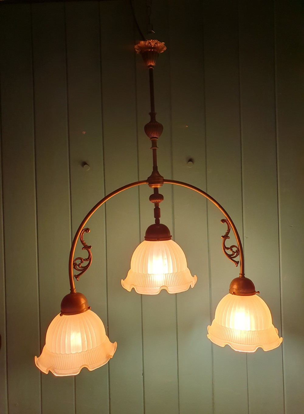 Edwardian three light brass chandelier with glass shades 23
