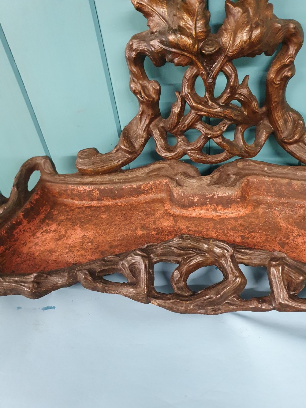 A Victorian cast iron stick stand featuring naturalistic branch and foliage decoration with a drip tray base. View II