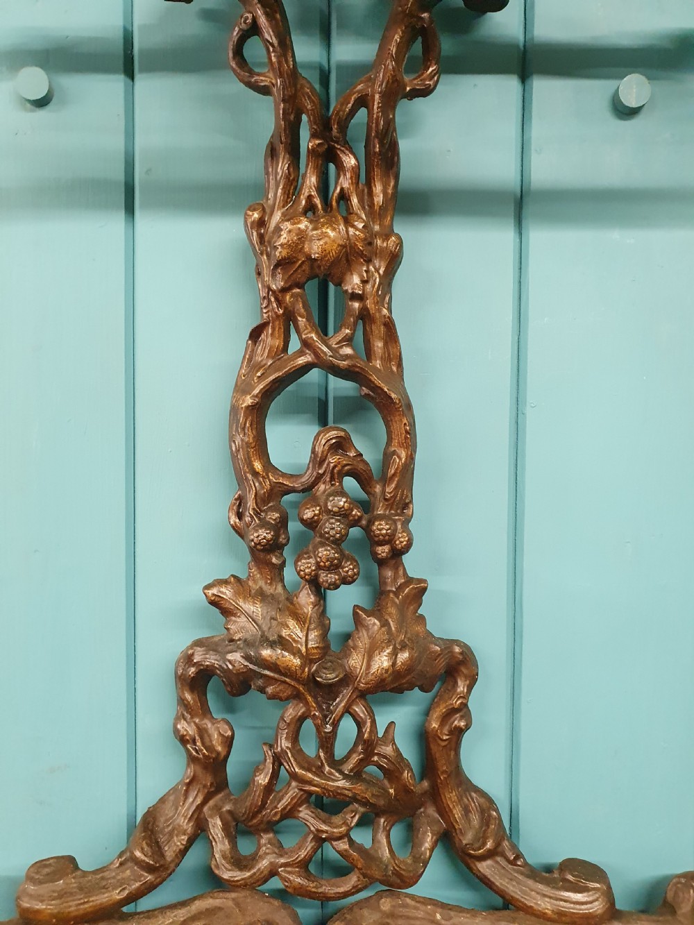 A Victorian cast iron stick stand featuring naturalistic branch and foliage decoration with a drip tray base. View VII