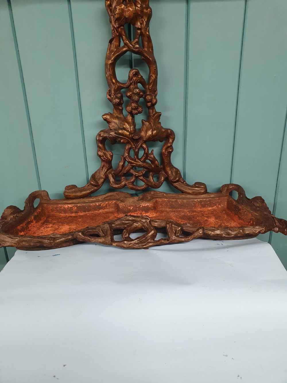 A Victorian cast iron stick stand featuring naturalistic branch and foliage decoration with a drip tray base. View VIII
