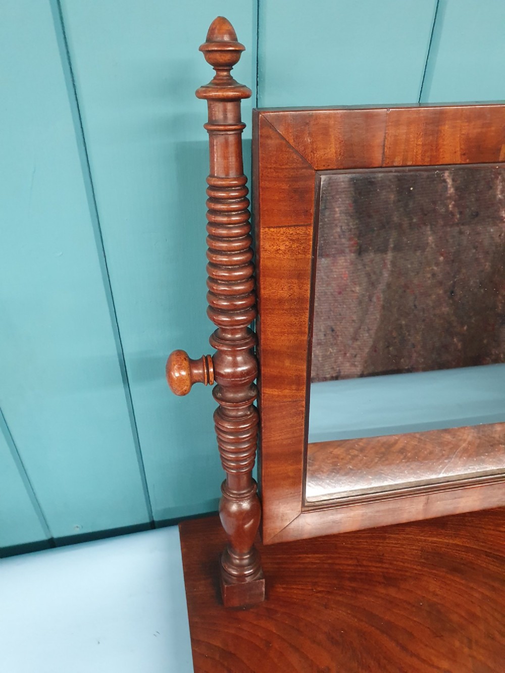 A 19th-century rectangular mahogany dressing mirror with turned side posts resting on a flat plinth base. View III